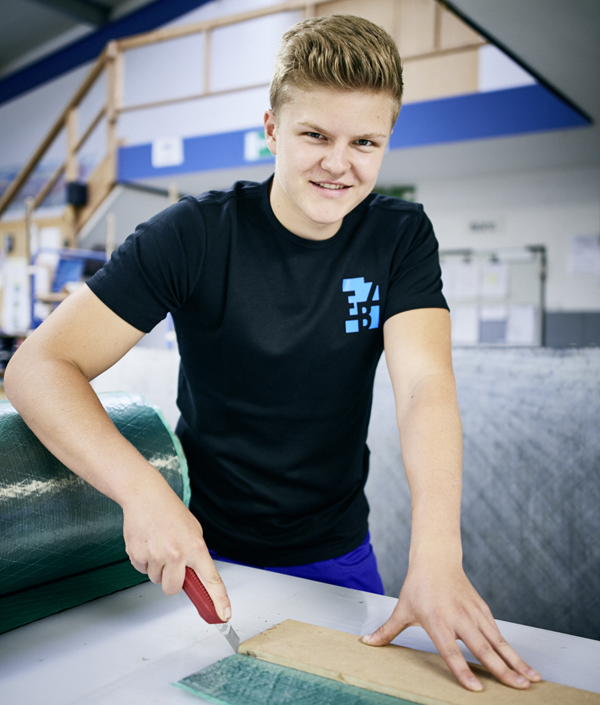 A prospective process mechanic works with a variety of materials during his vocational training.