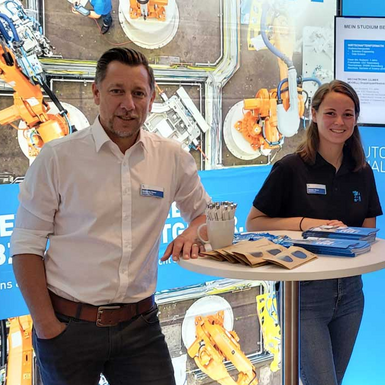 Our trainers and trainees in front of the EBZ Group stand at the Education Fair in Ravensburg.